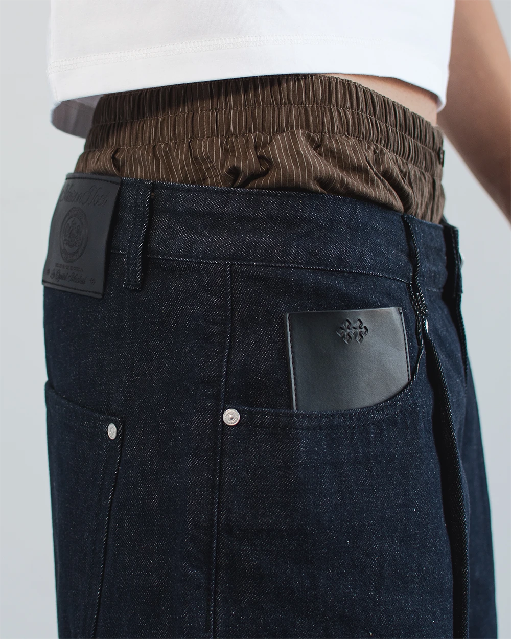 RAW DENIM PLEATED SHORTS