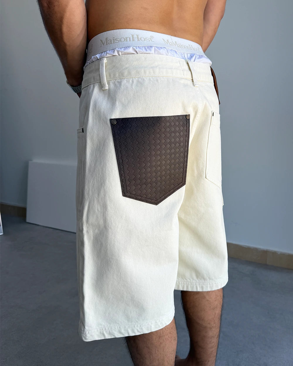 LEATHER POCKET ECRU SHORTS