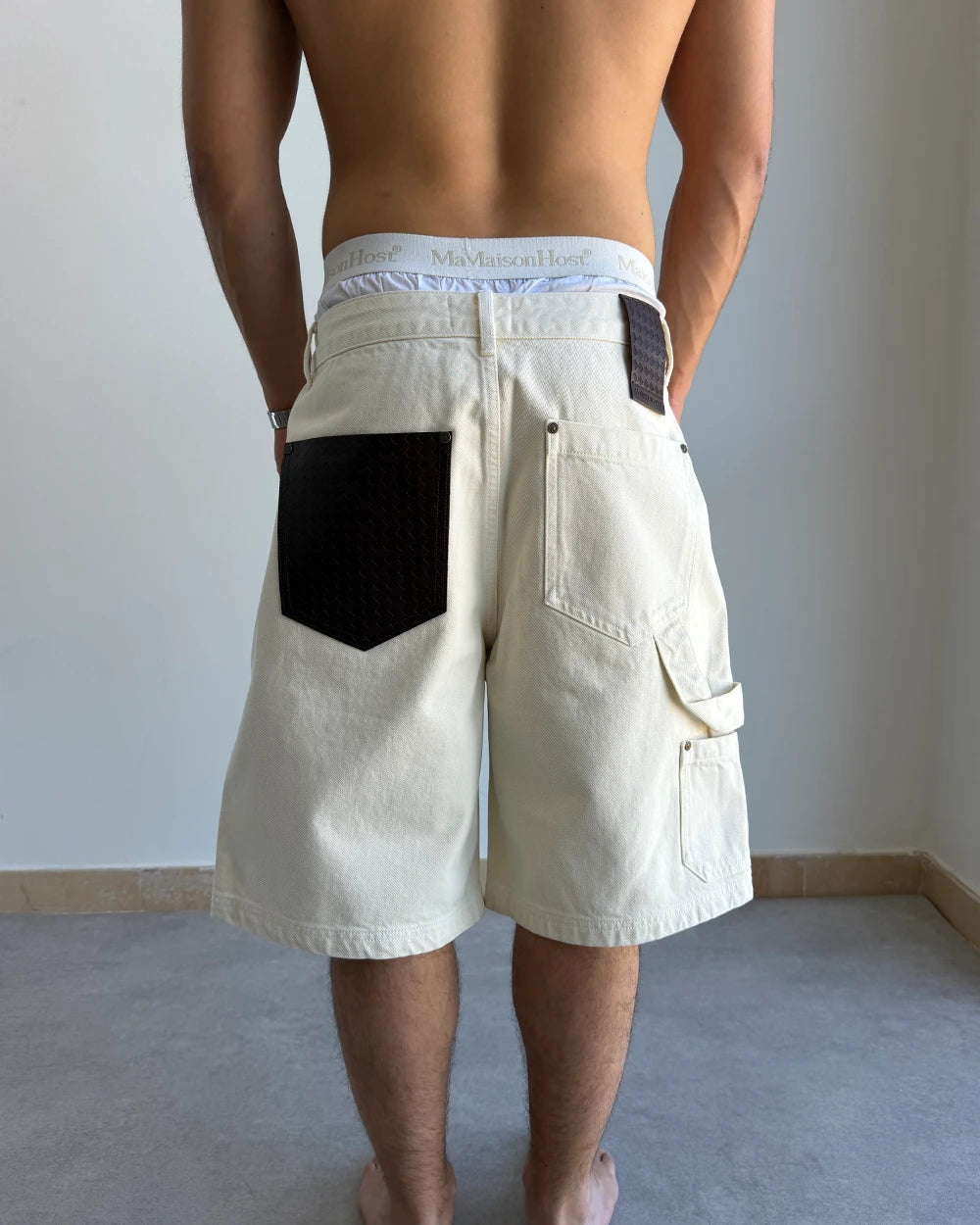 LEATHER POCKET ECRU SHORTS
