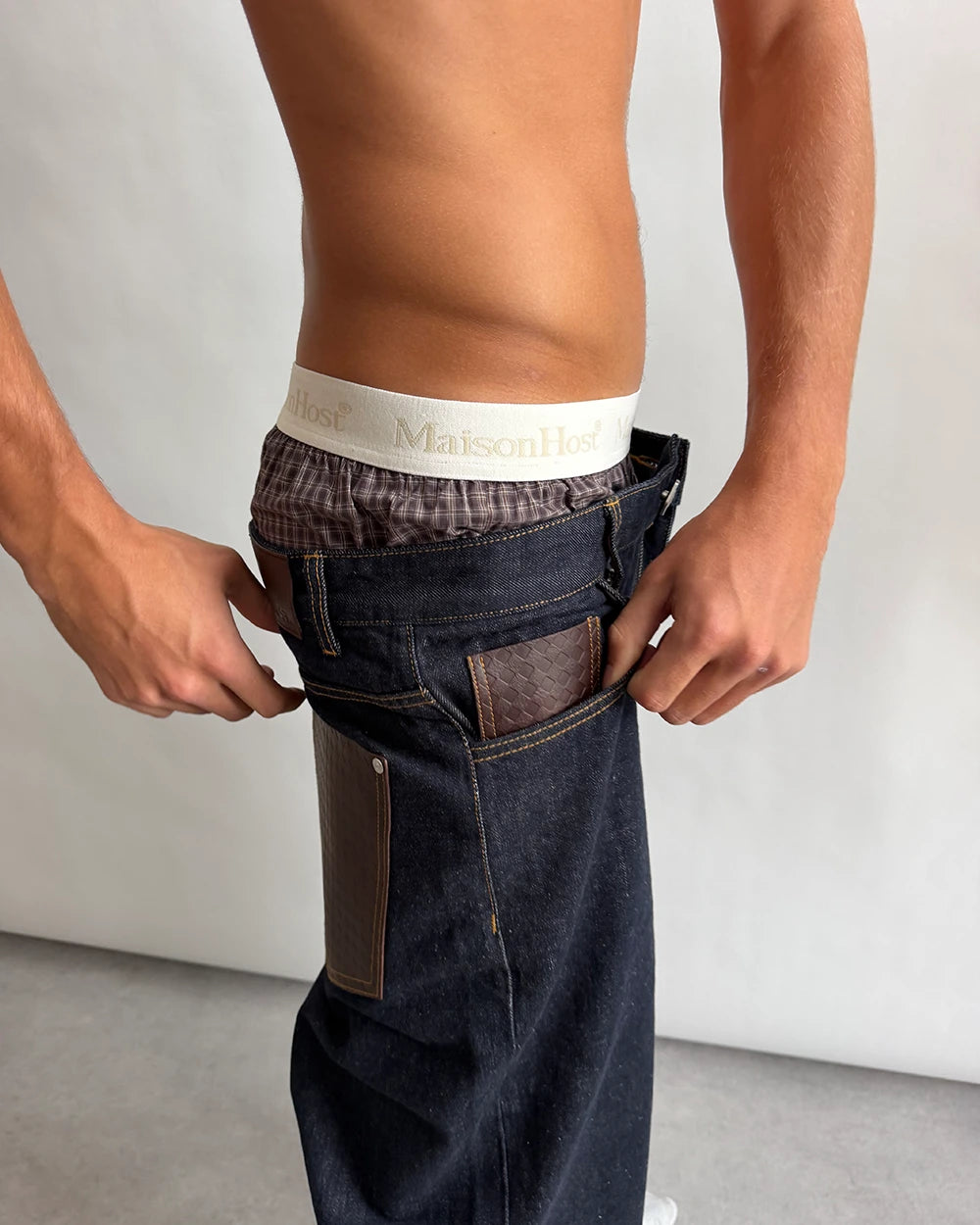RAW LEATHER POCKET JEANS