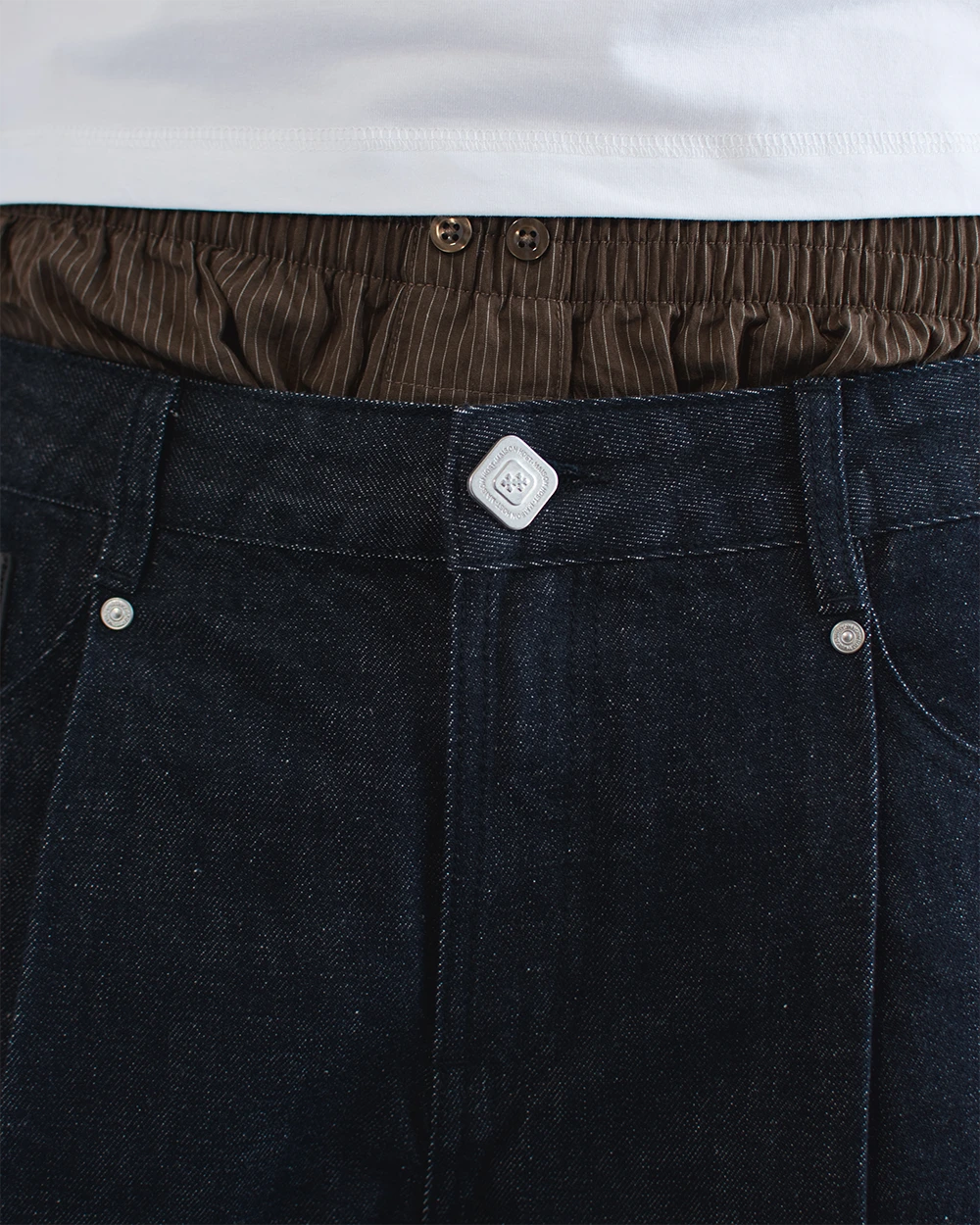 RAW DENIM PLEATED SHORTS