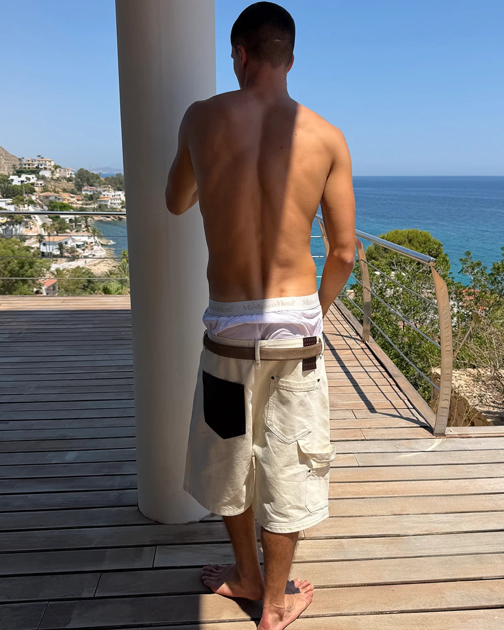 LEATHER POCKET ECRU SHORTS
